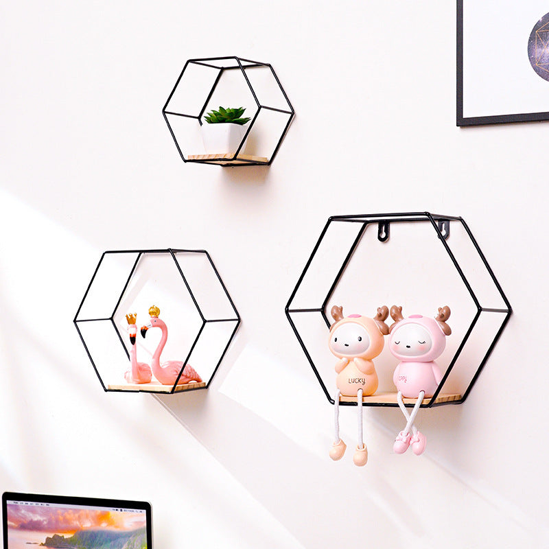 Hexagonal Shelves On Wrought Iron Wall