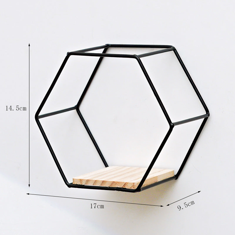 Hexagonal Shelves On Wrought Iron Wall